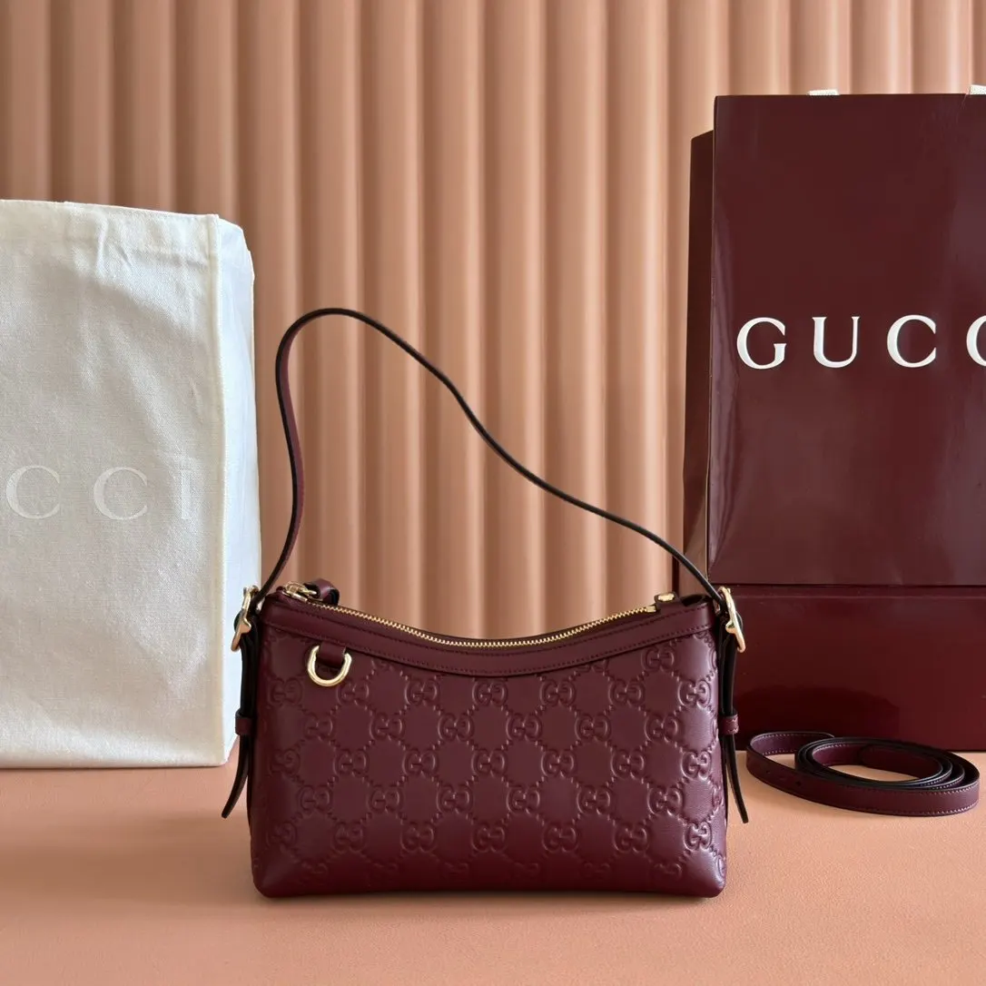 Gucci GG Emblem 金色 皮革 腋下包 复古腋下背款