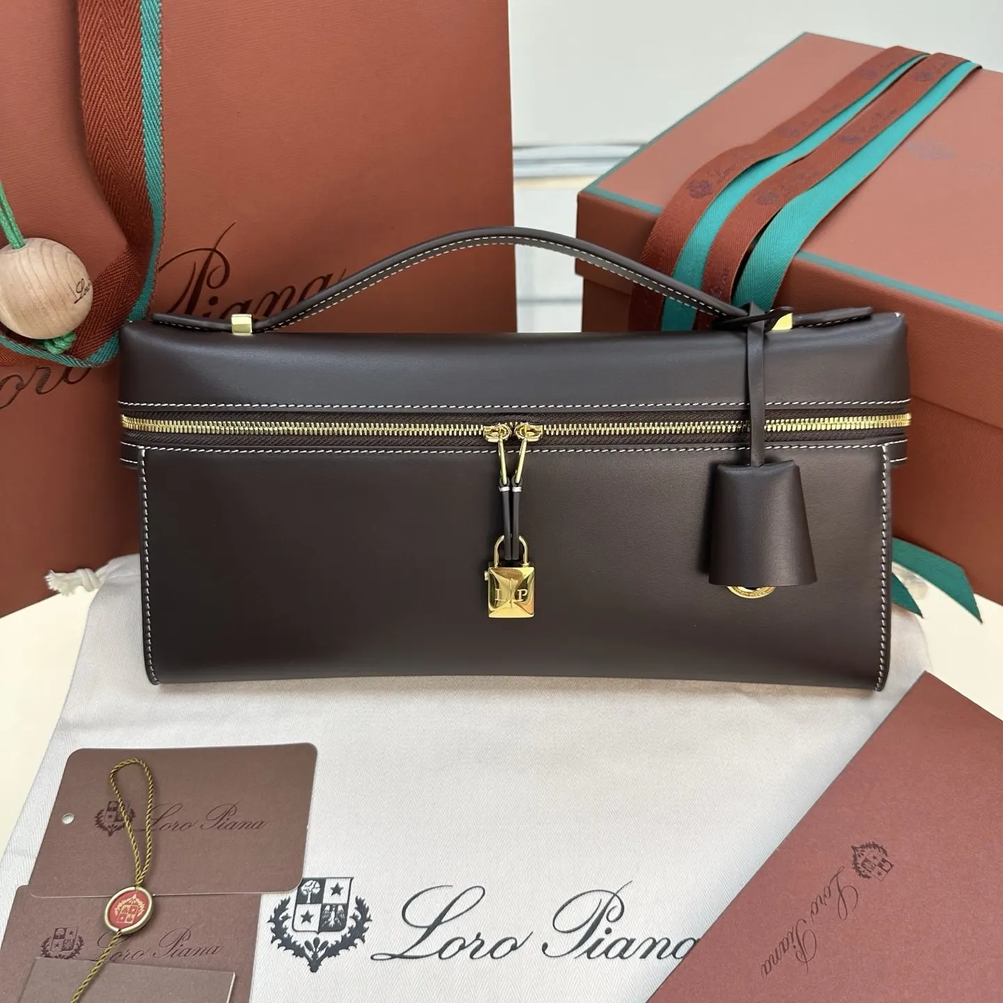 Saddle 牛皮 手拿包 精致手拿款