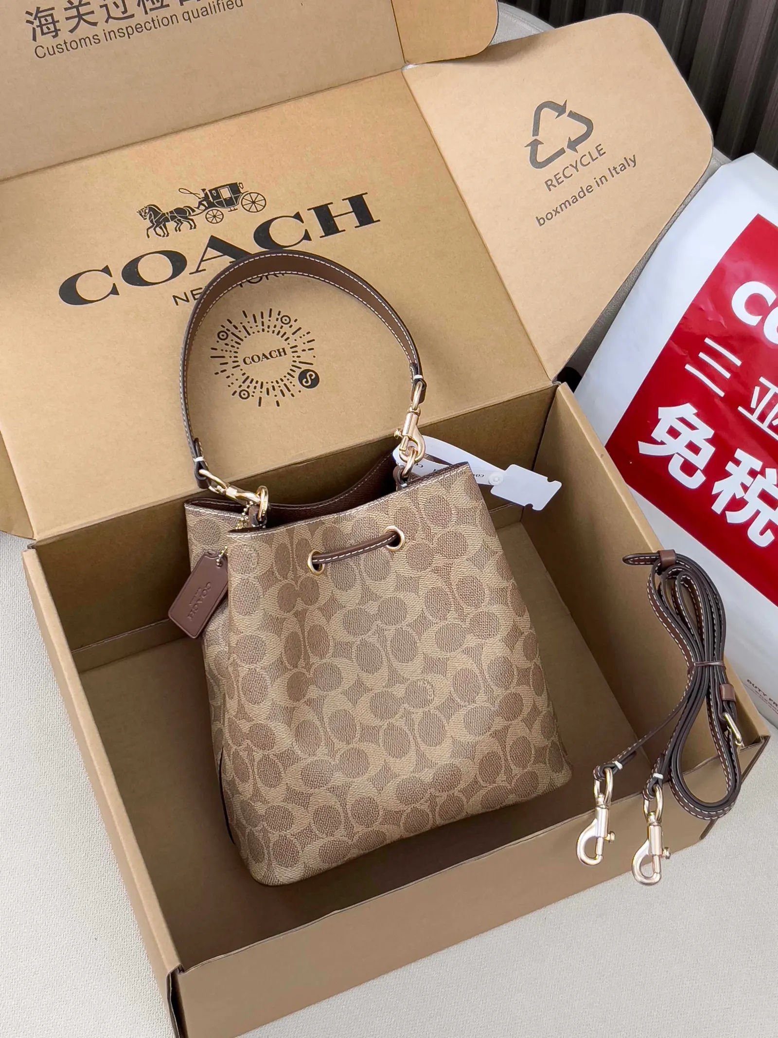 Coach 老花 图片 家经典老花Rowan抽绳单 腋下包 复古腋下背款