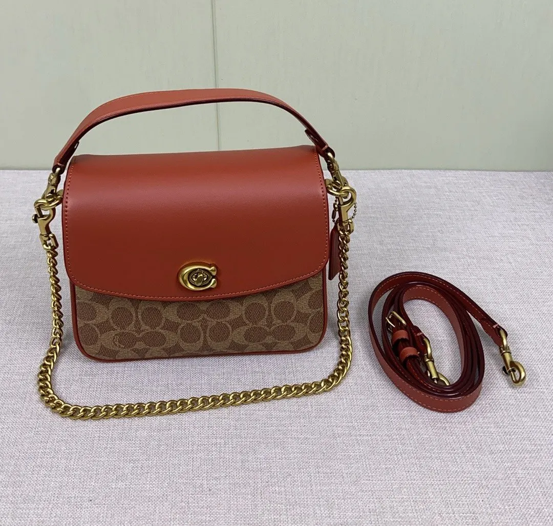 Coach 老花 斜背包 輕便斜挎款