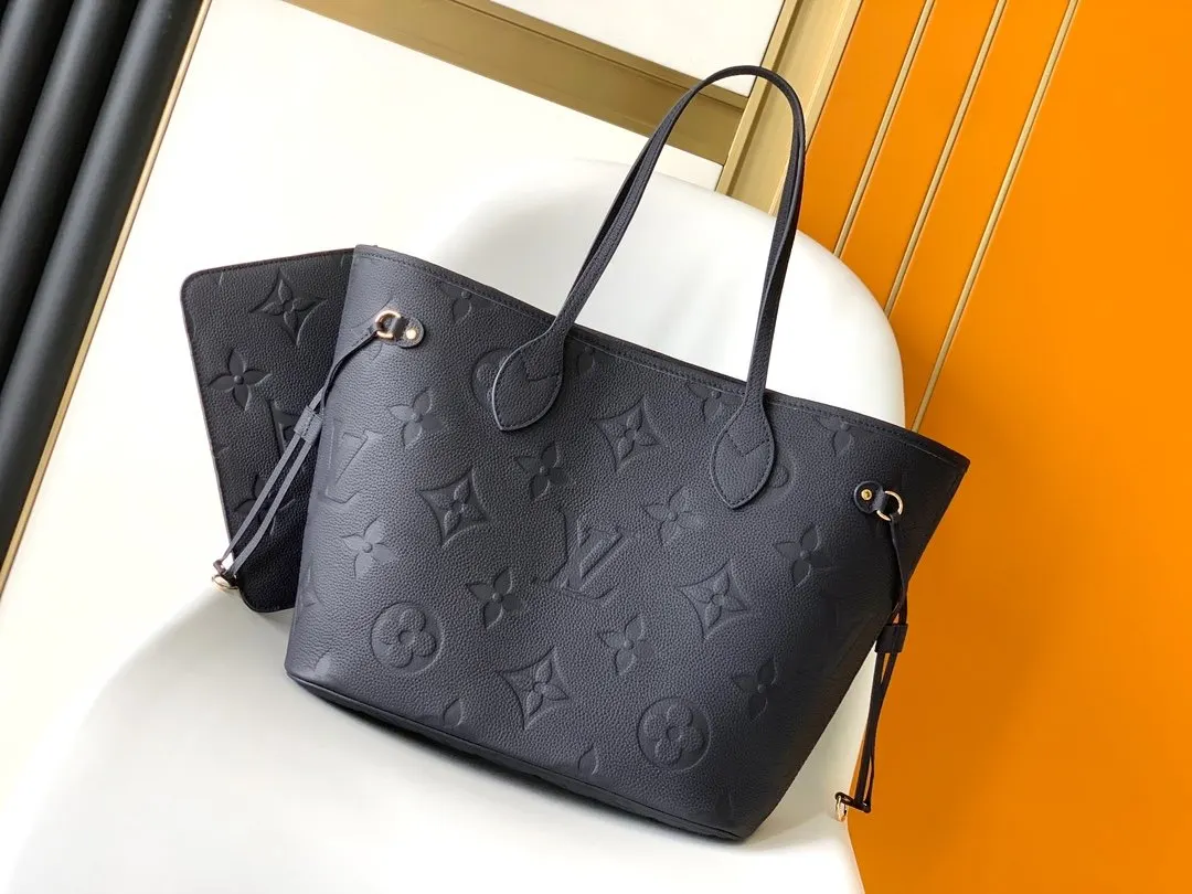 Neverfull 黑色 白色 手拿包 精致手拿款