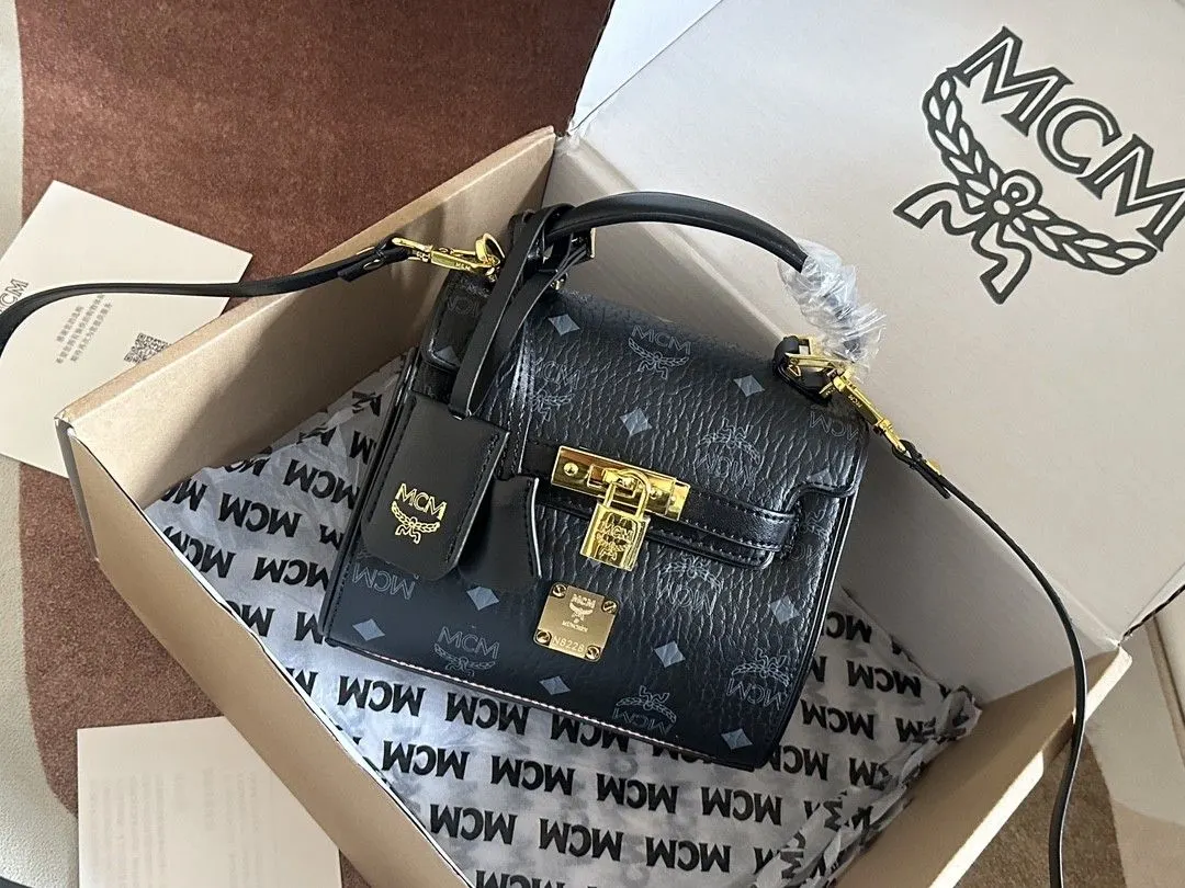 Kelly 黑色 牛皮 款号 MCM 經典款 Kelly凯莉手 斜背包 輕便斜挎款