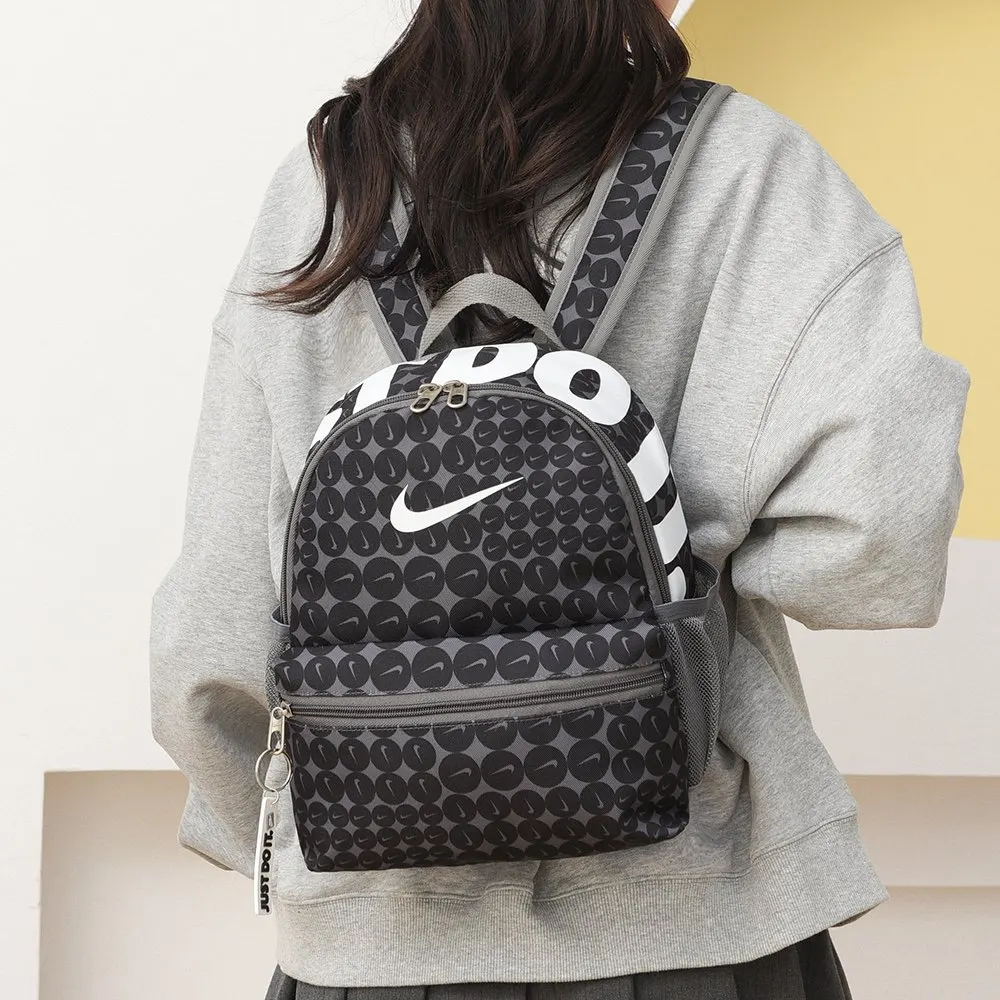 NIKE耐克 色迷你小容量休閒雙肩包卡通可 实用雙肩款