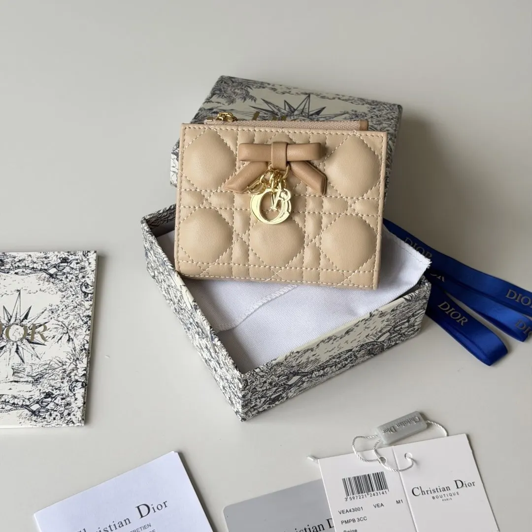 Dior 米色羊皮蝴蝶结化妝包 手拿款