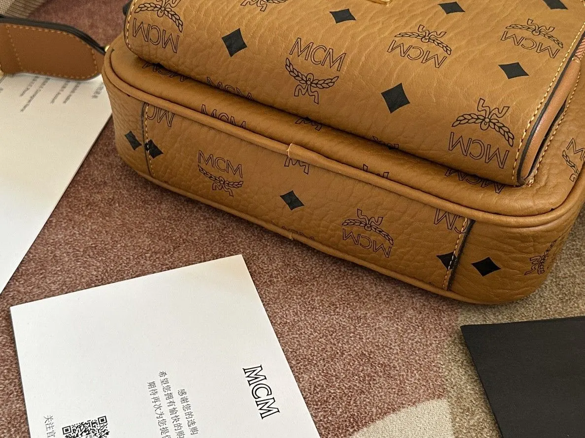 牛皮 款号 MCM 斜背包 Aren斜挎 輕便斜挎款(數字9) 牛皮 款号 MCM 斜背包 Aren斜挎 輕便斜挎款(數字9)