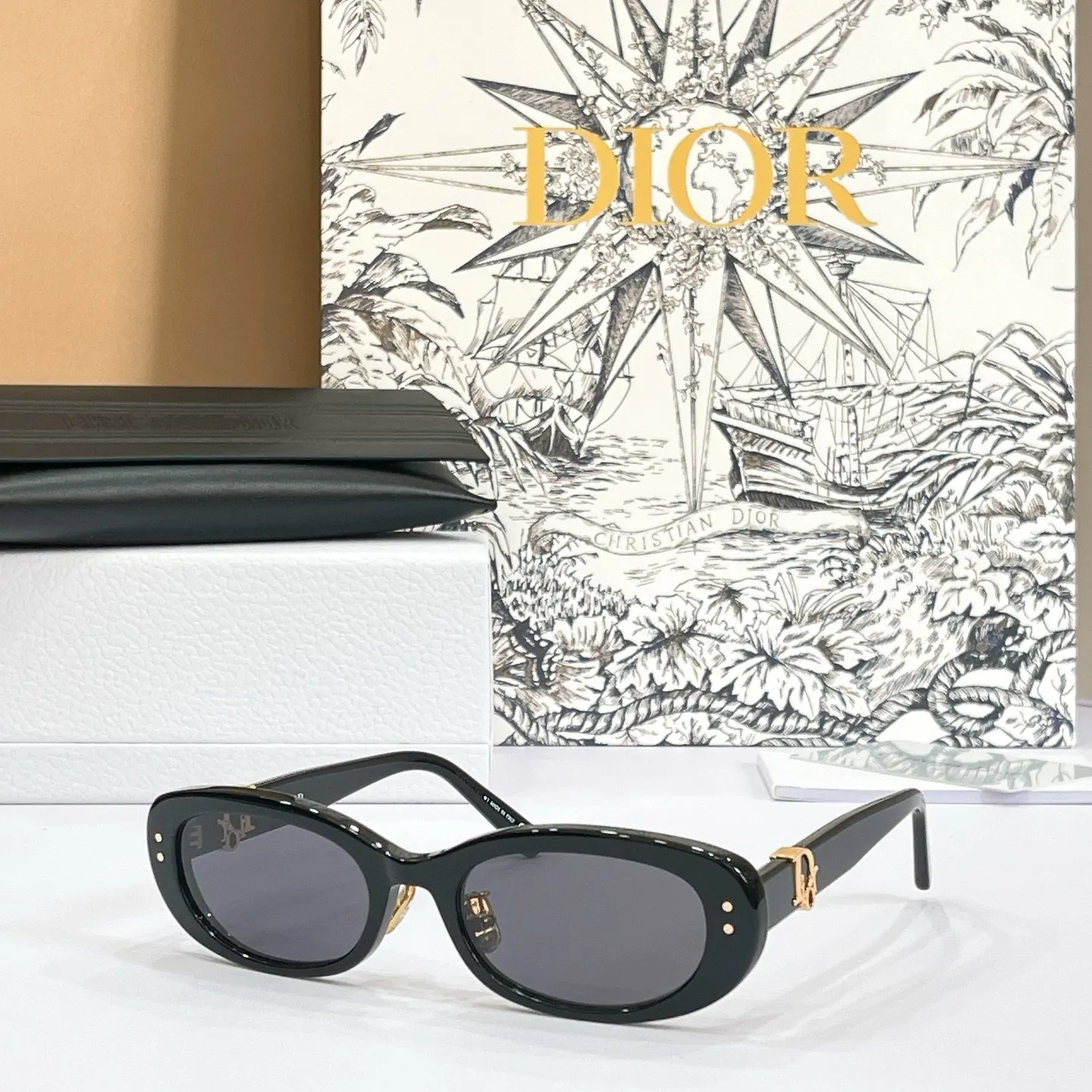 Dior Oblique Black Oval Sunglasses – Monogram Temple Detail