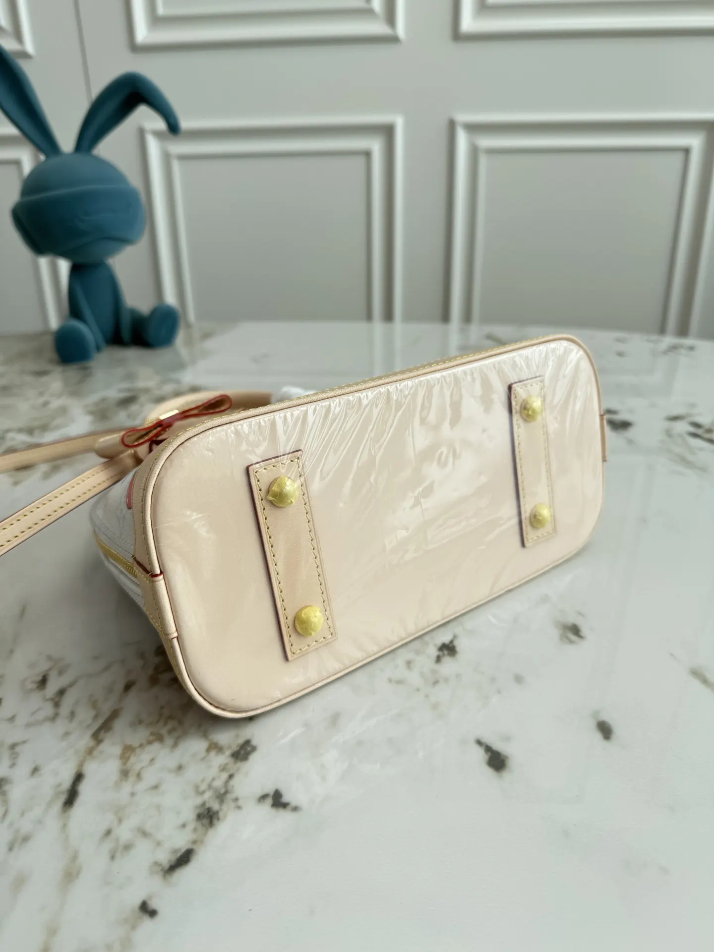 Louis Vuitton Alma Monogram Handbag