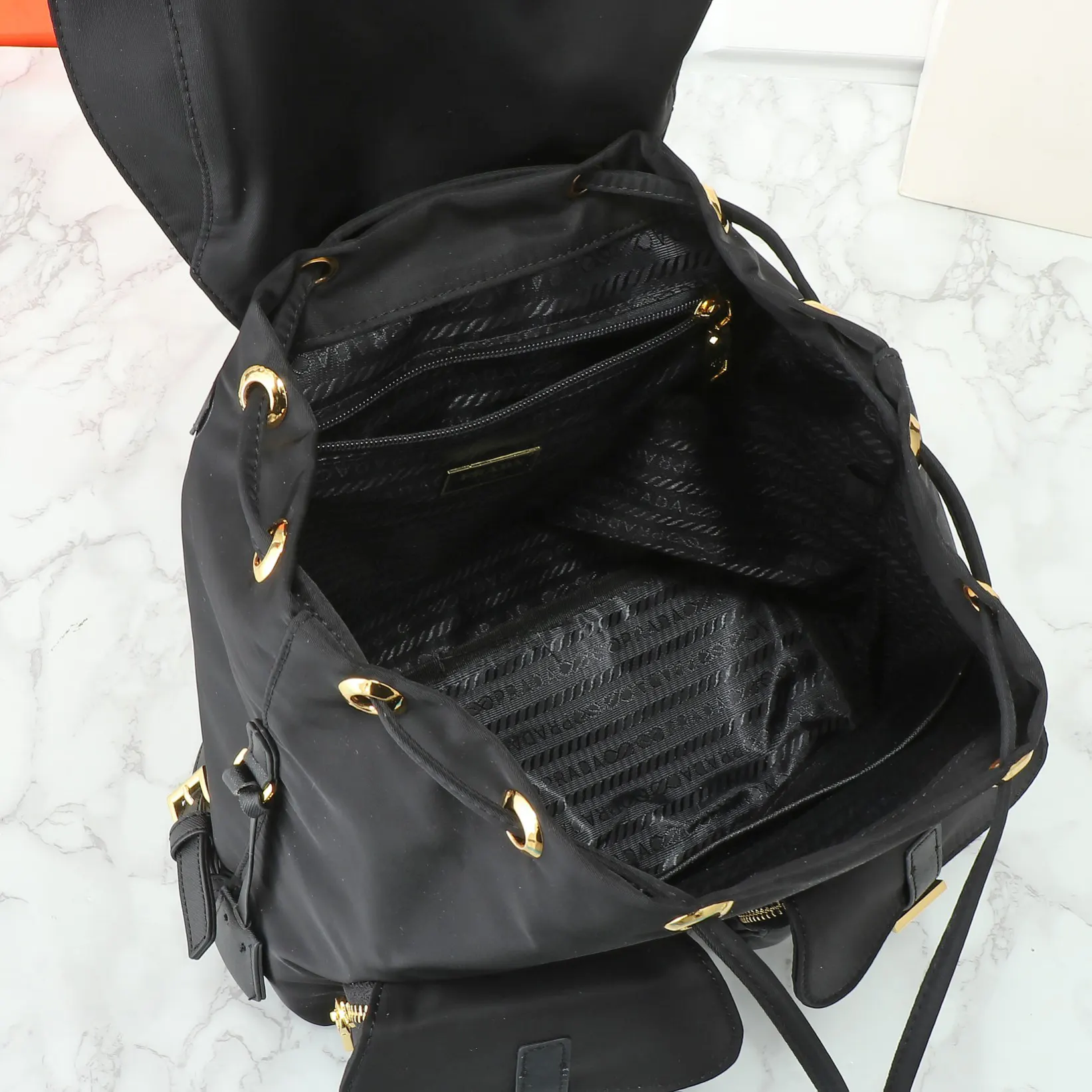Prada Re-Nylon 金色 皮革 双肩包