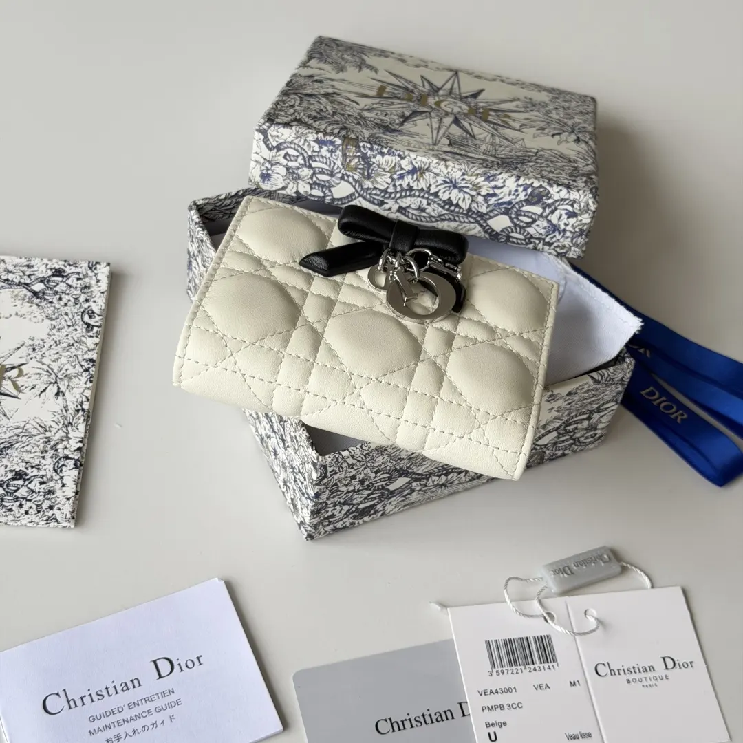 Dior 白色羊皮蝴蝶结化妆包 手拿款