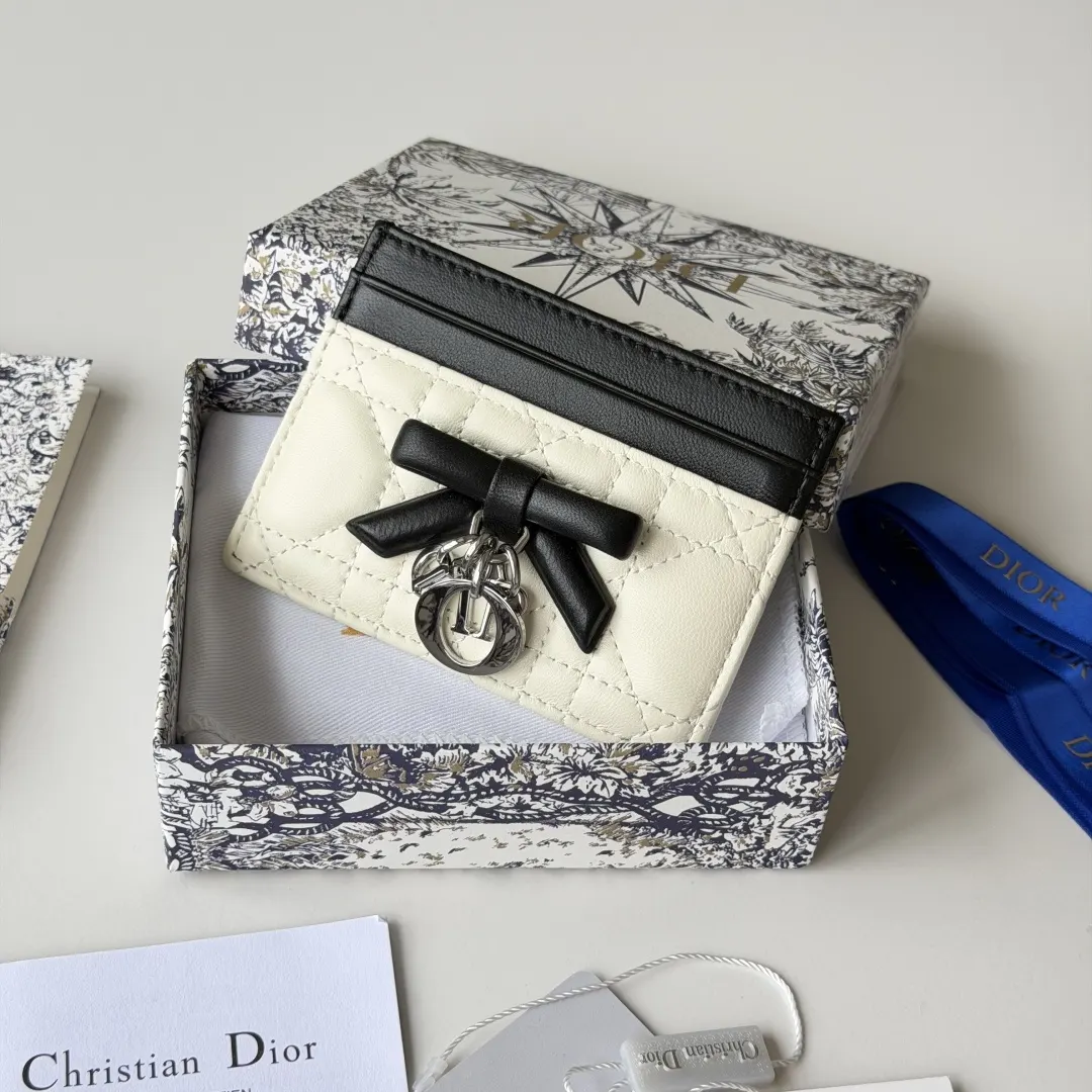 Dior 白色羊皮蝴蝶结化妆包 收纳