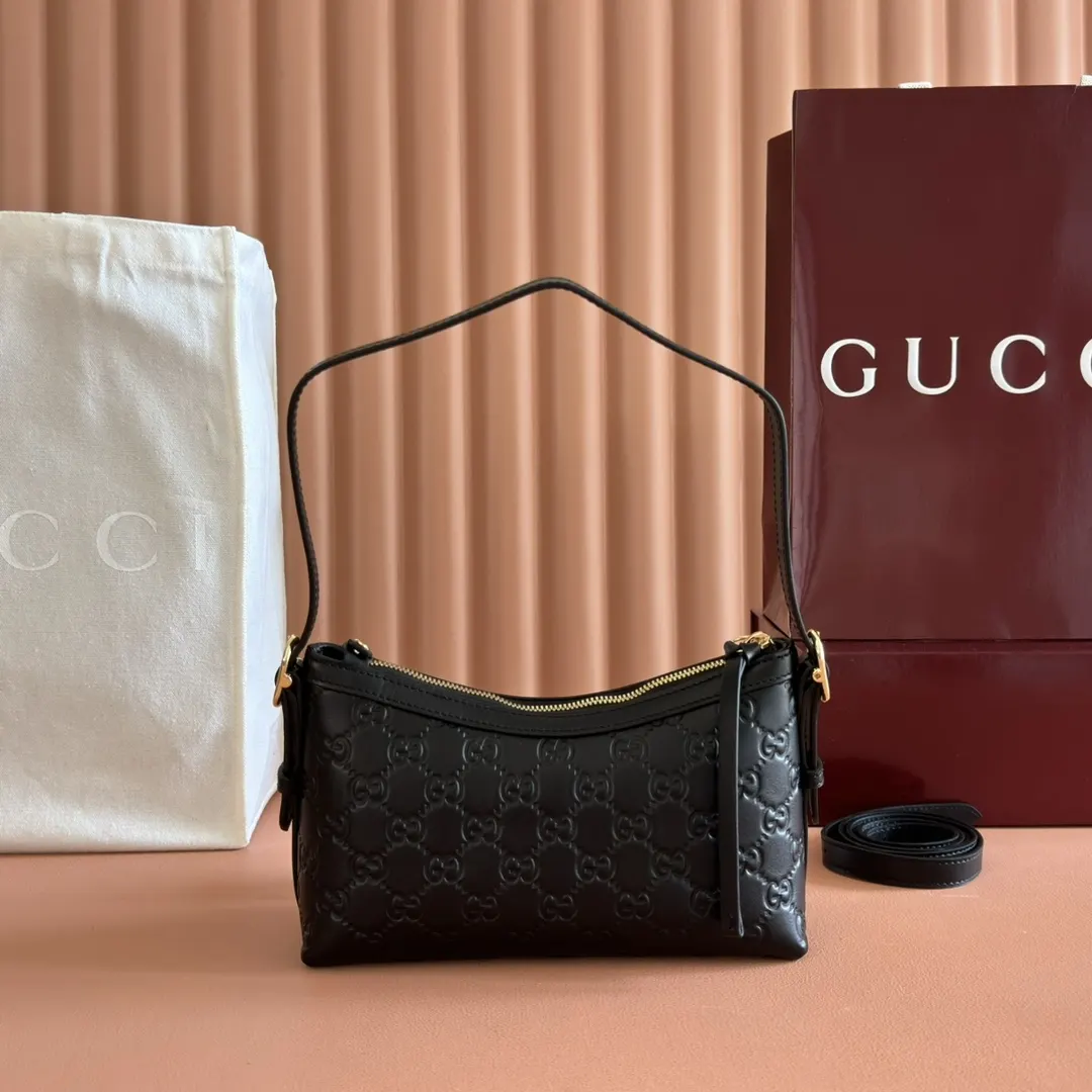 Gucci GG Emblem 金色 皮革 腋下包 复古腋下背款