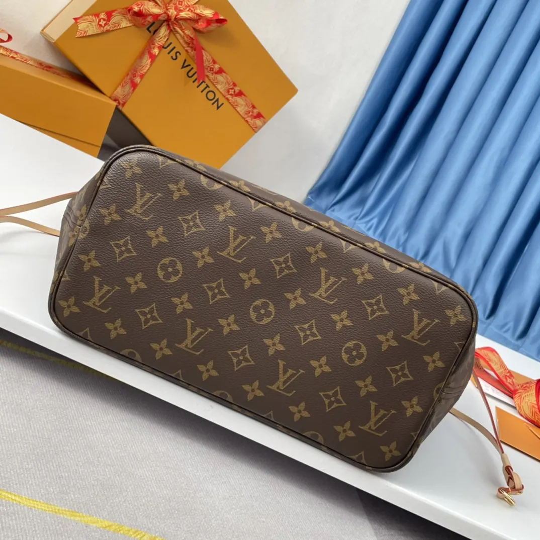 Neverfull 牛皮 手拿包 精致手拿款