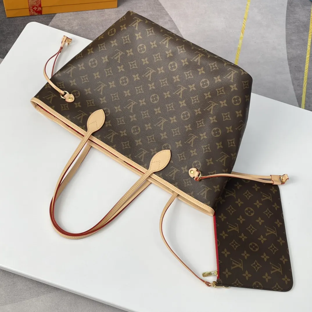 Neverfull 牛皮 手拿包 精致手拿款