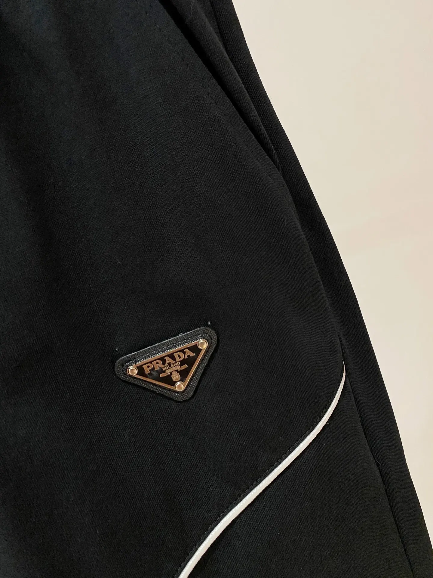 Prada Triangle Logo Zip Polo Shirt In Black