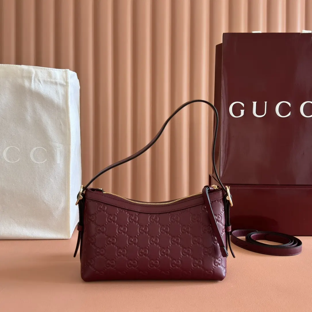Gucci GG Emblem 金色 皮革 腋下包 复古腋下背款