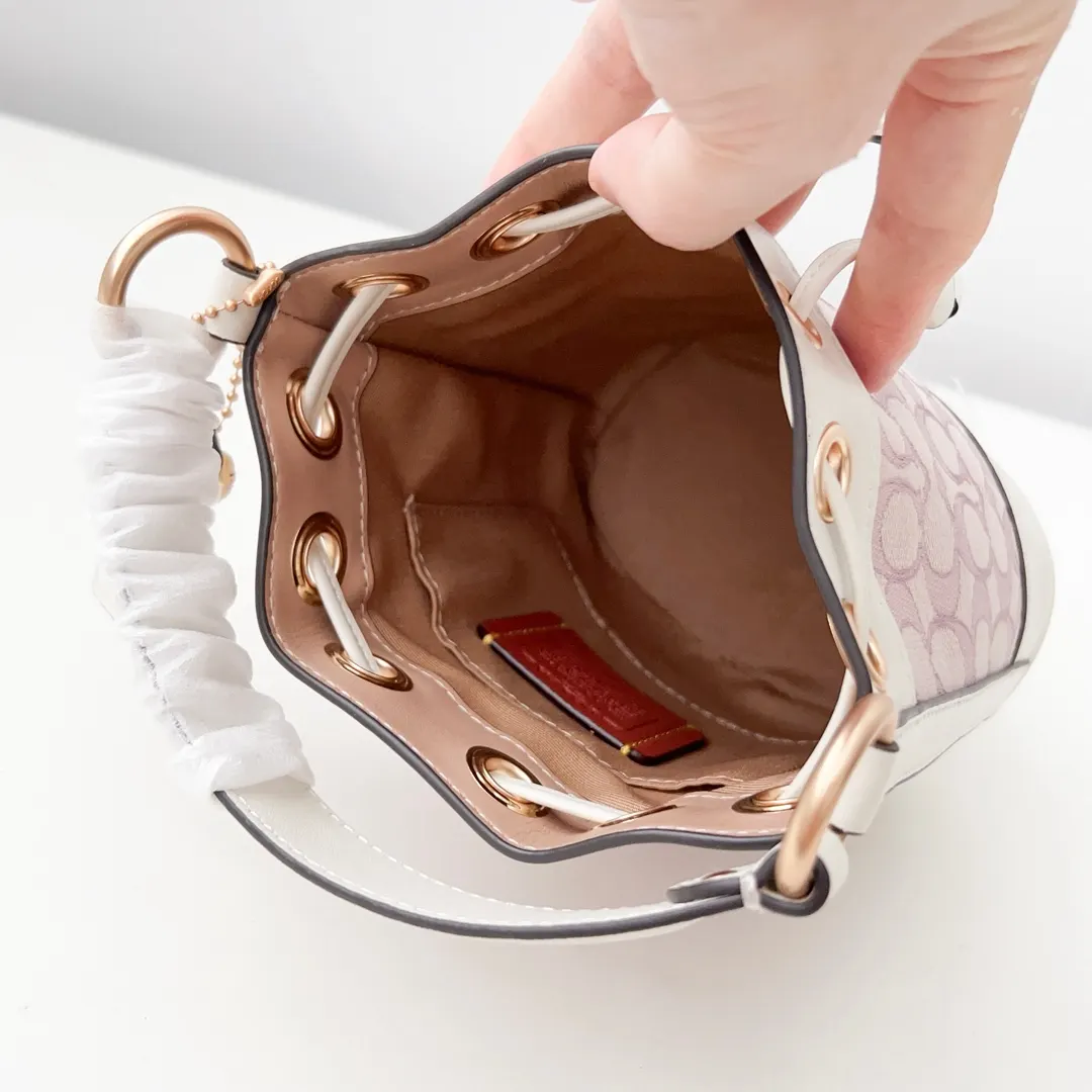 Coach 牛皮 mini水桶包 刺繡C布 搭 休閒水桶款(數字9) Coach 牛皮 mini水桶包 刺繡C布 搭 休閒水桶款(數字9)