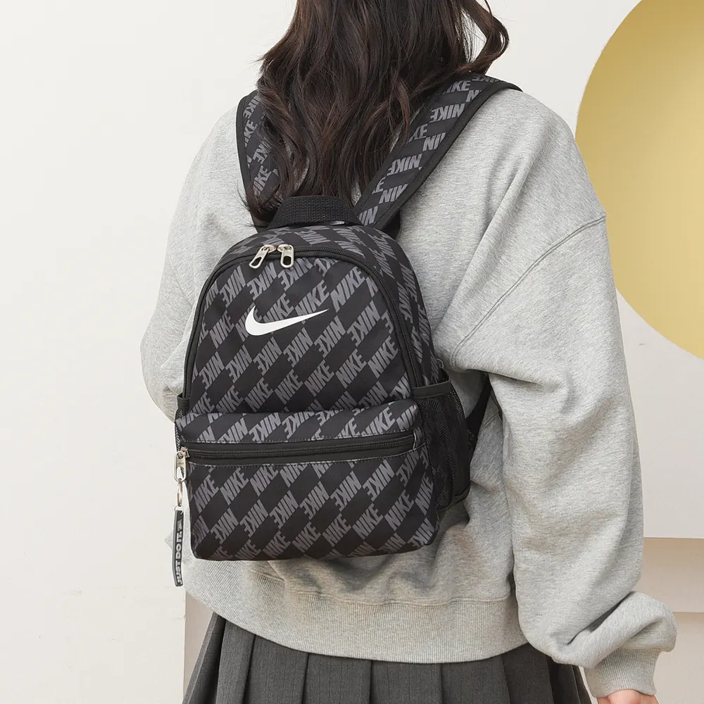 NIKE耐克 色迷你小容量休閒雙肩包卡通可 实用雙肩款