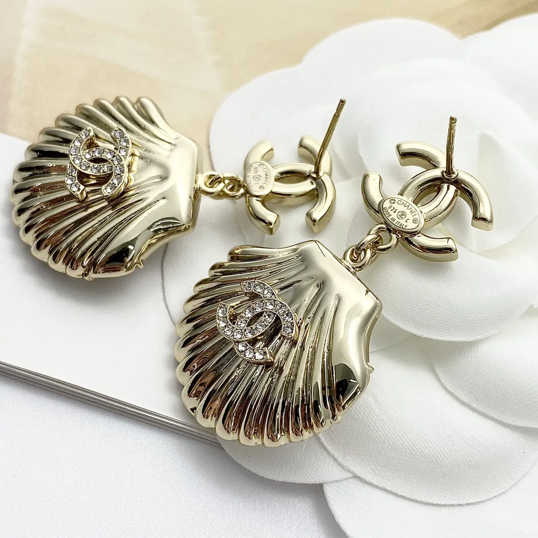 Chanel Gold Pearl Earrings