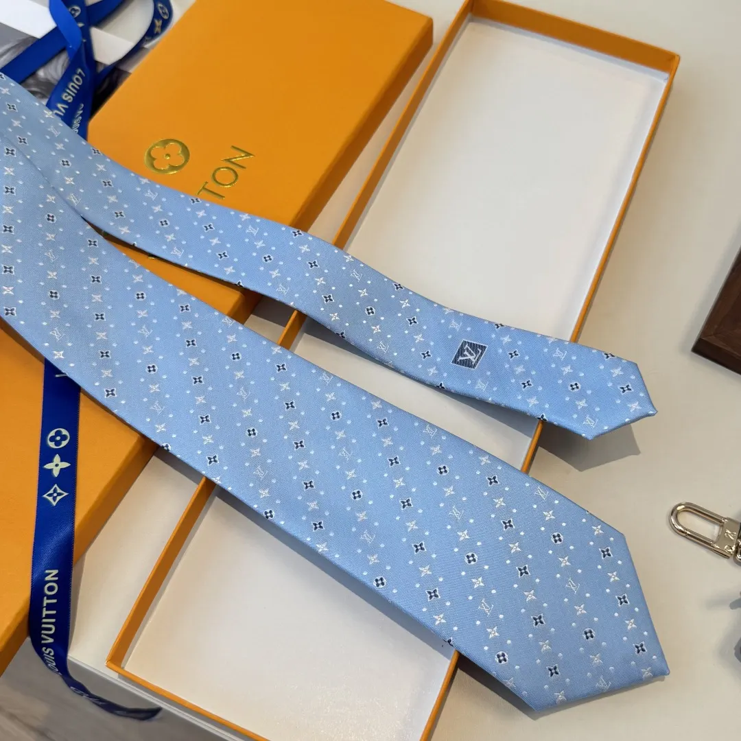 Hermès 橙色 领带 精致配飾(數字7) Hermès 橙色 领带 精致配飾(數字7)