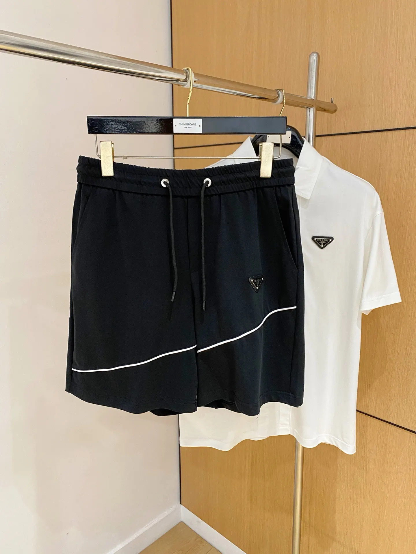 Prada Triangle Logo Zip Polo Shirt In White