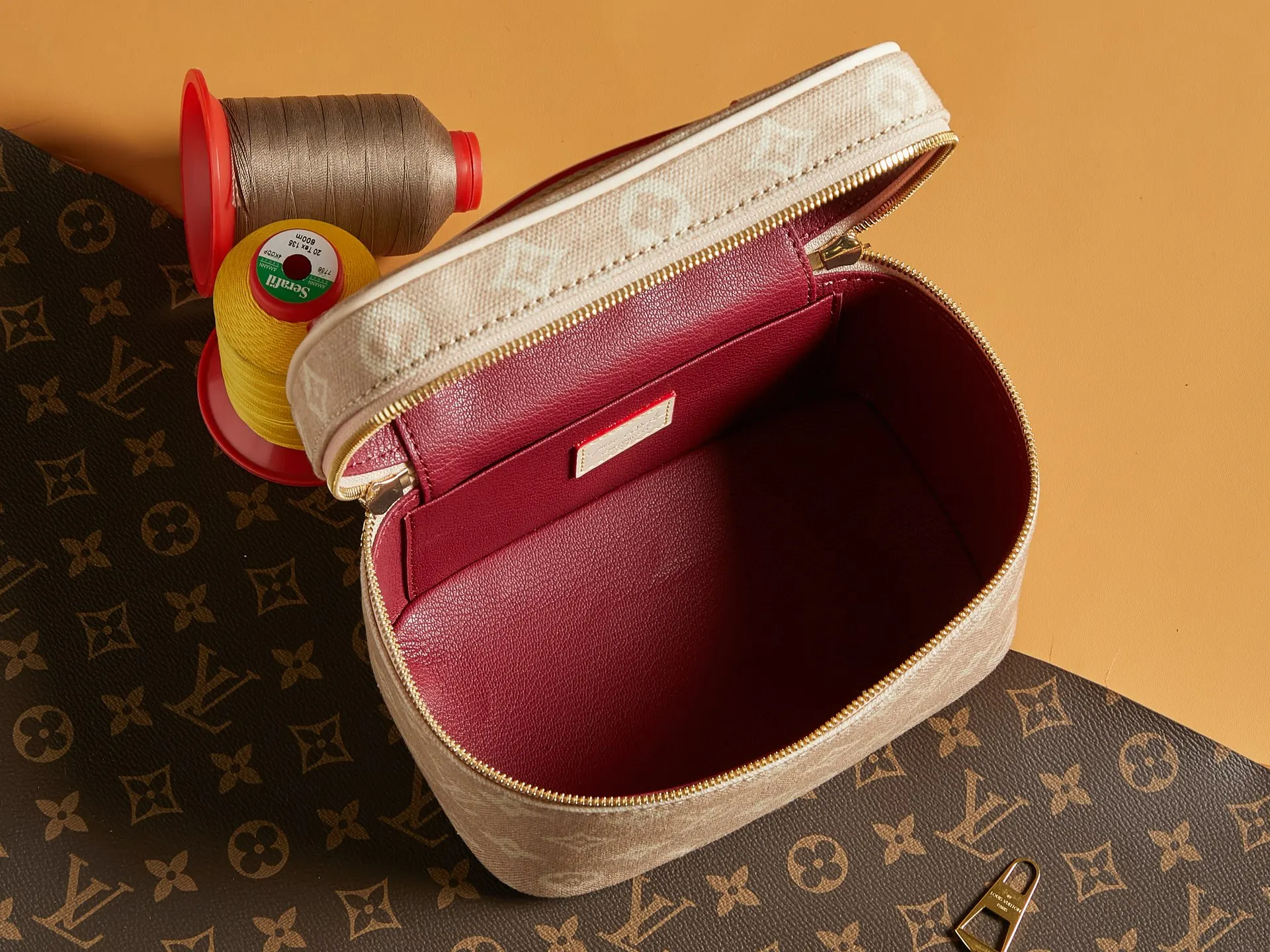 Louis Vuitton Gold Cosmetic Pouch Canvas