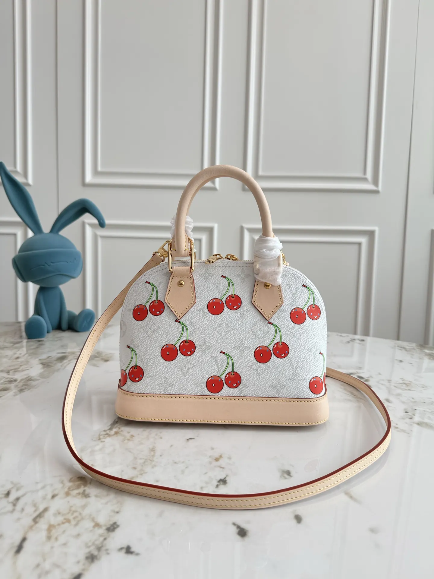 Louis Vuitton Alma Monogram Handbag