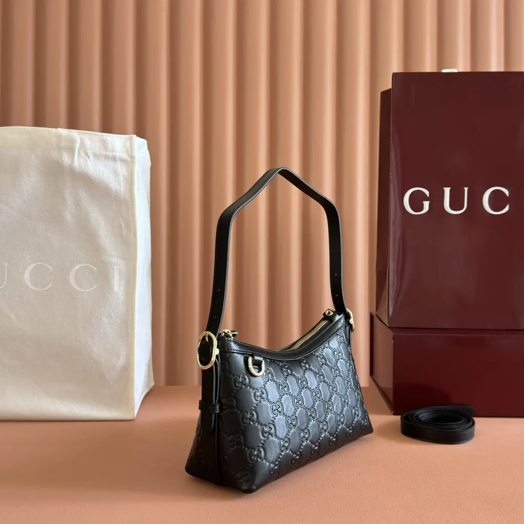 Gucci GG Emblem 金色 皮革 腋下包 复古腋下背款