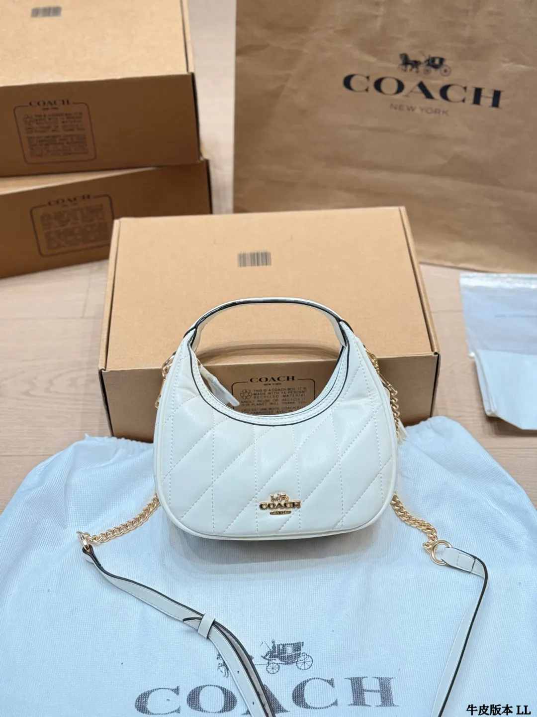 Coach 白色 奶白 牛皮 斜背包 輕便斜挎款