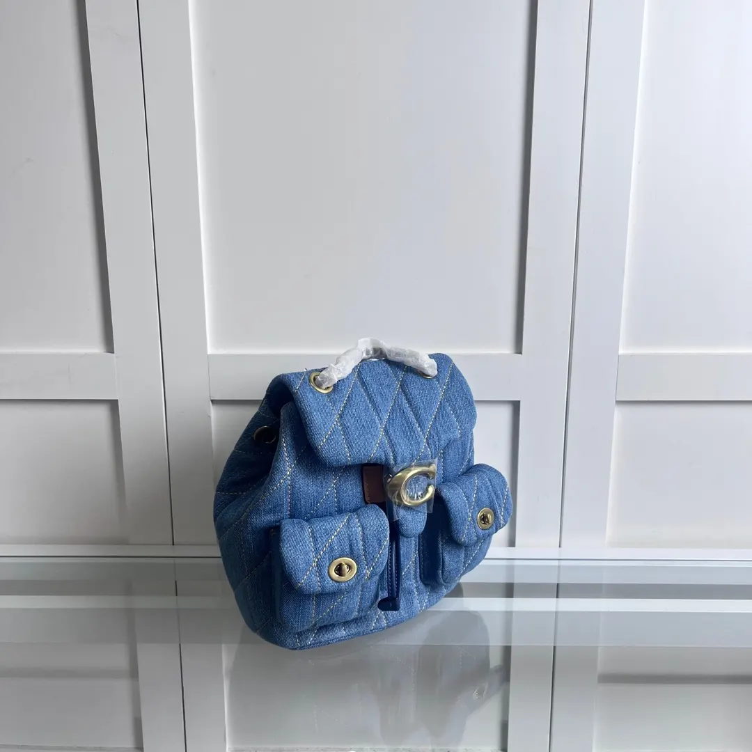 Coach 女士菱格纹绗缝TABBY雙肩包背包大容 实用雙肩款