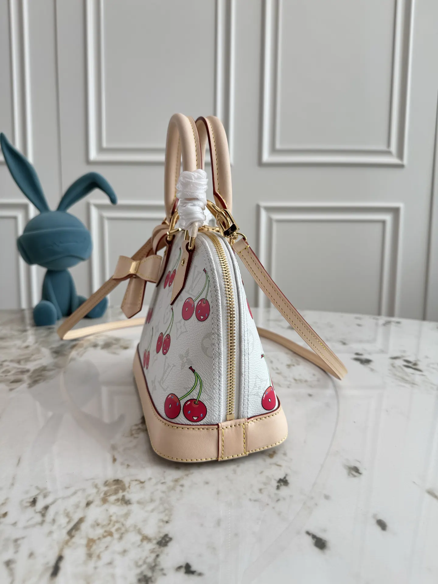 Louis Vuitton Alma Monogram Handbag