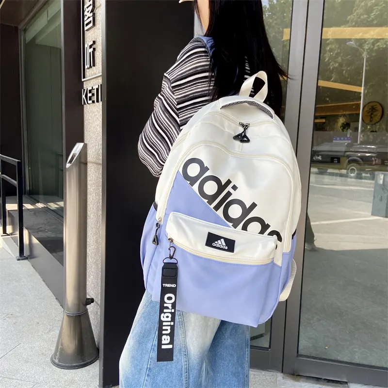 男女情侣款街头潮流休閒時尚百搭个性運動包学院风 雙肩包 实用雙肩款