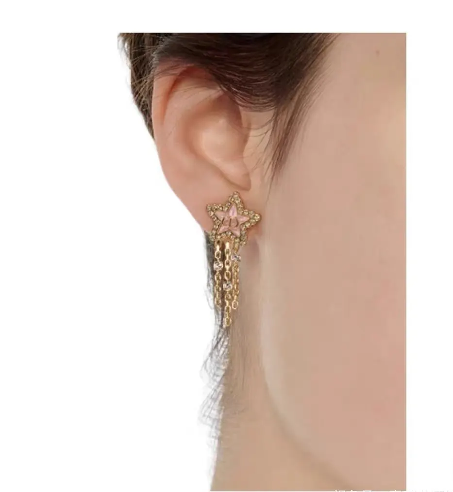 Dior Gold Star Earrings