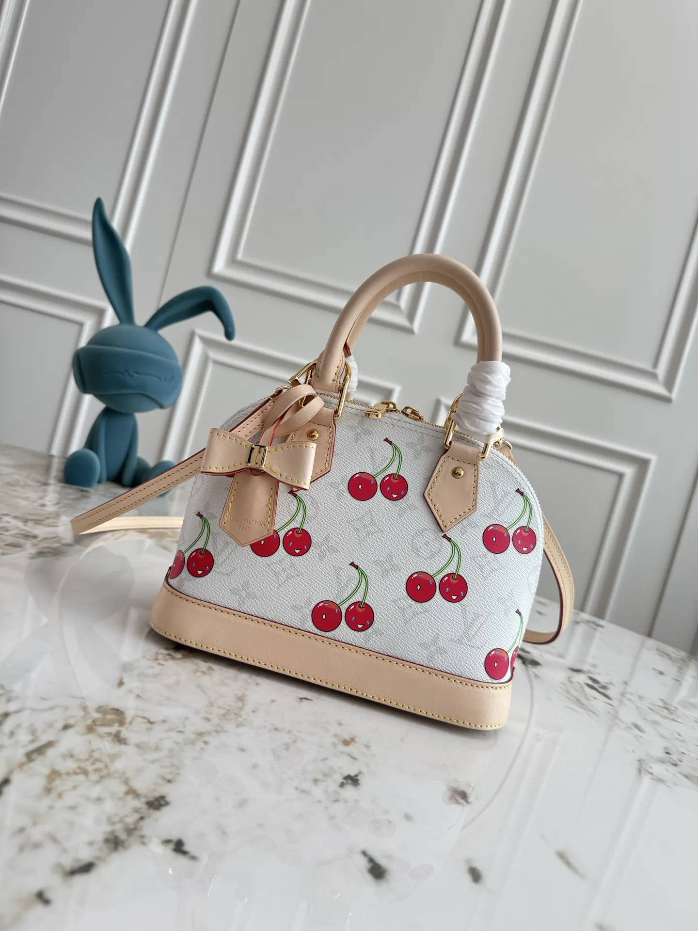 Louis Vuitton Alma Monogram Handbag