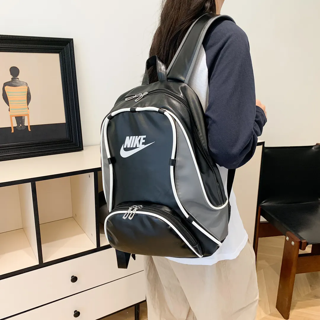 NIKE耐克 男女同款个性休閒户外大容量運動包 雙肩包 实用雙肩款
