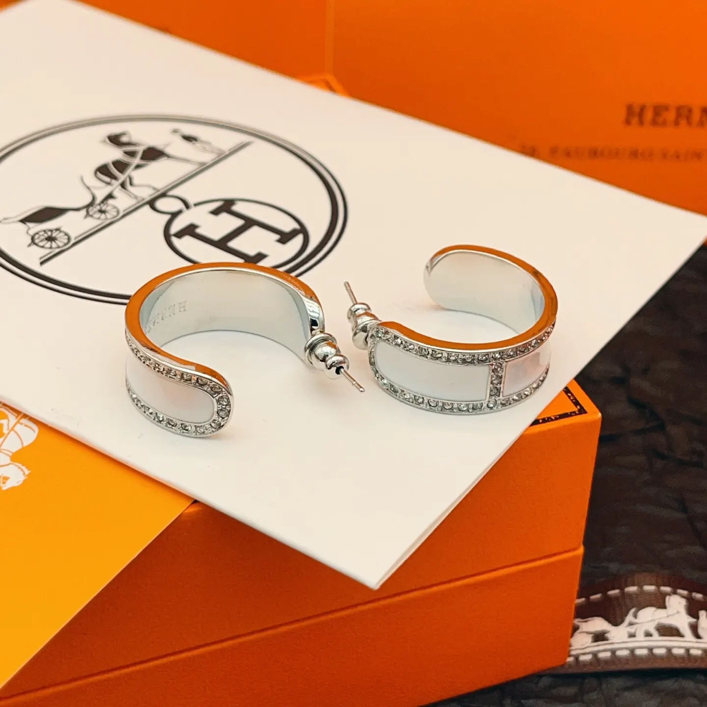 Hermès White Earrings