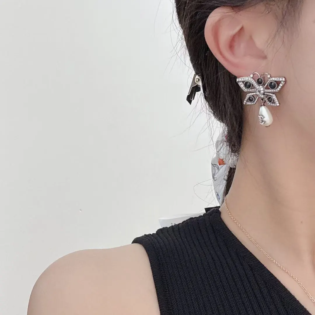 Chanel Gray Pearl Earrings