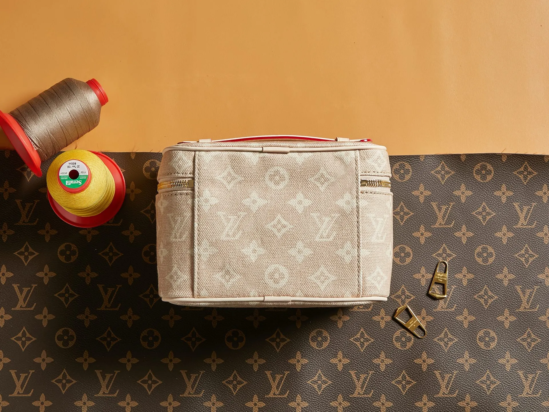 Louis Vuitton Gold Cosmetic Pouch Canvas