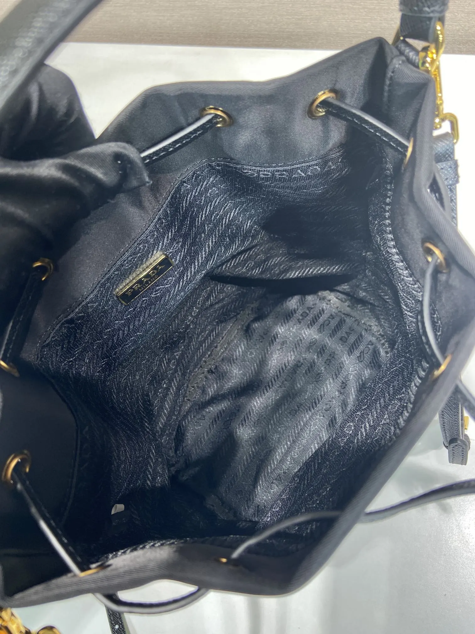 Prada Re-Nylon Leather Saffiano Bucket Bag