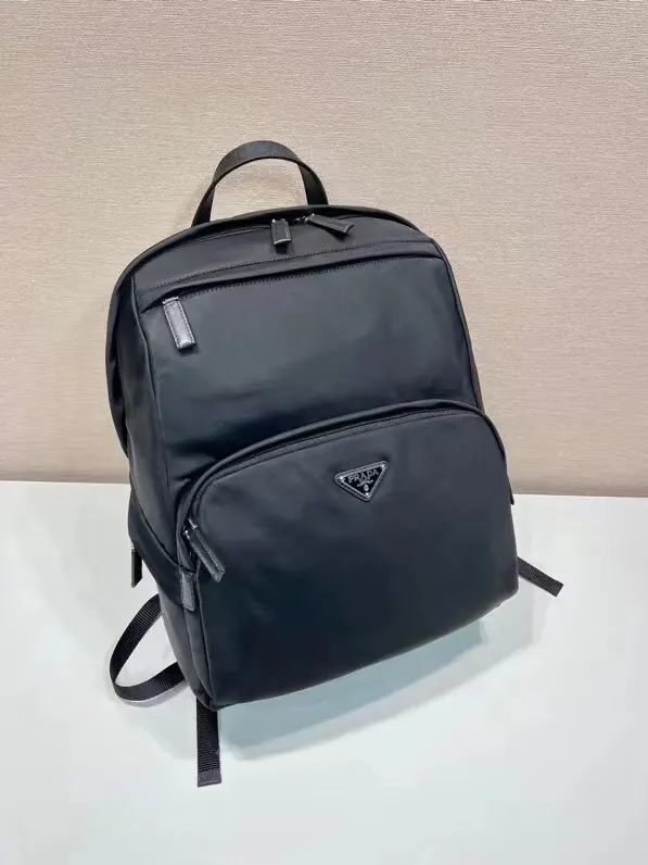 Prada 尼龙 十字纹牛皮 三角标 双肩背包 轻便实用
