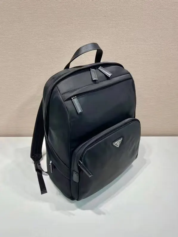 Prada 尼龙 十字纹牛皮 三角标 双肩背包 轻便实用