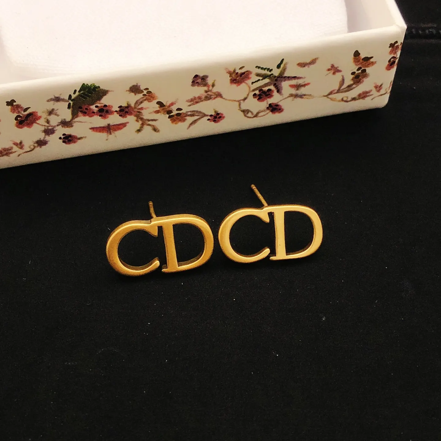 Dior CD金色发夹 黑色字母