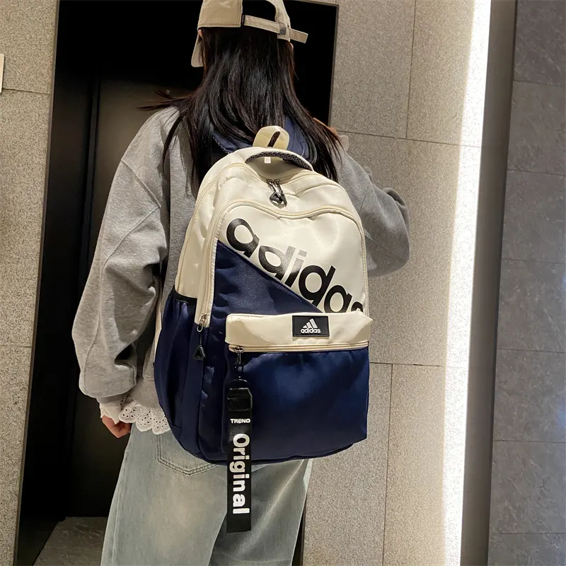 男女情侣款街头潮流休閒時尚百搭个性運動包学院风 雙肩包 实用雙肩款