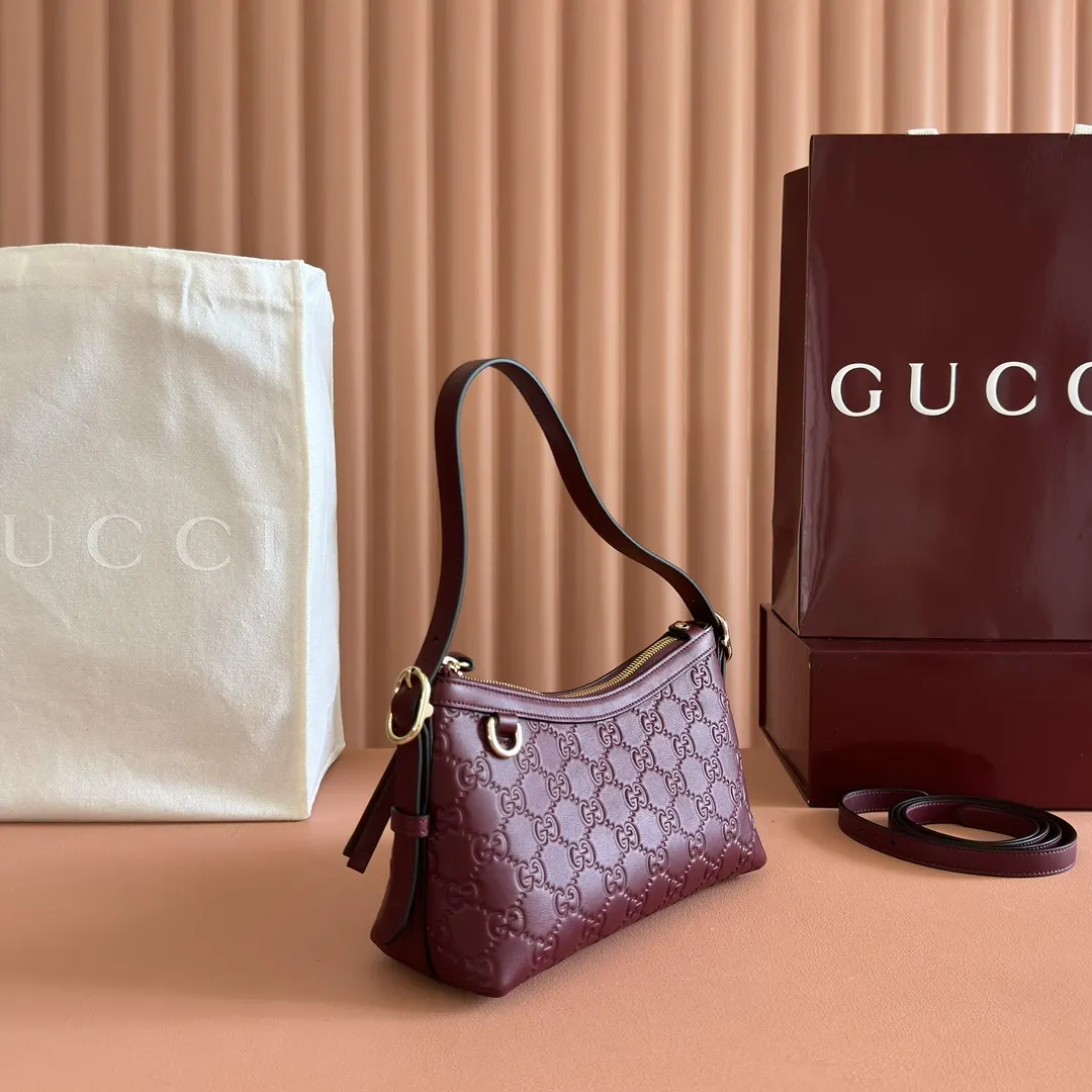 Gucci GG Emblem 金色 皮革 腋下包 复古腋下背款