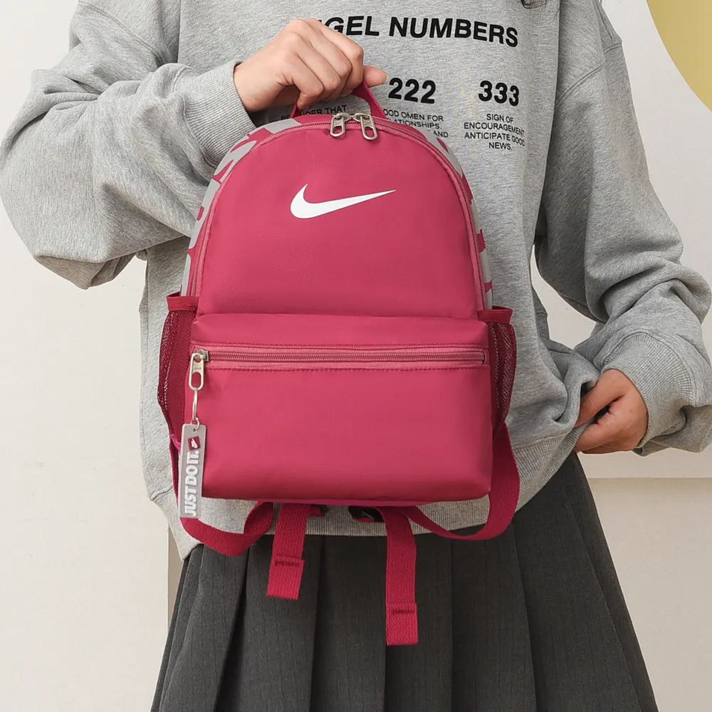 NIKE耐克 色迷你小容量休閒雙肩包卡通可 实用雙肩款