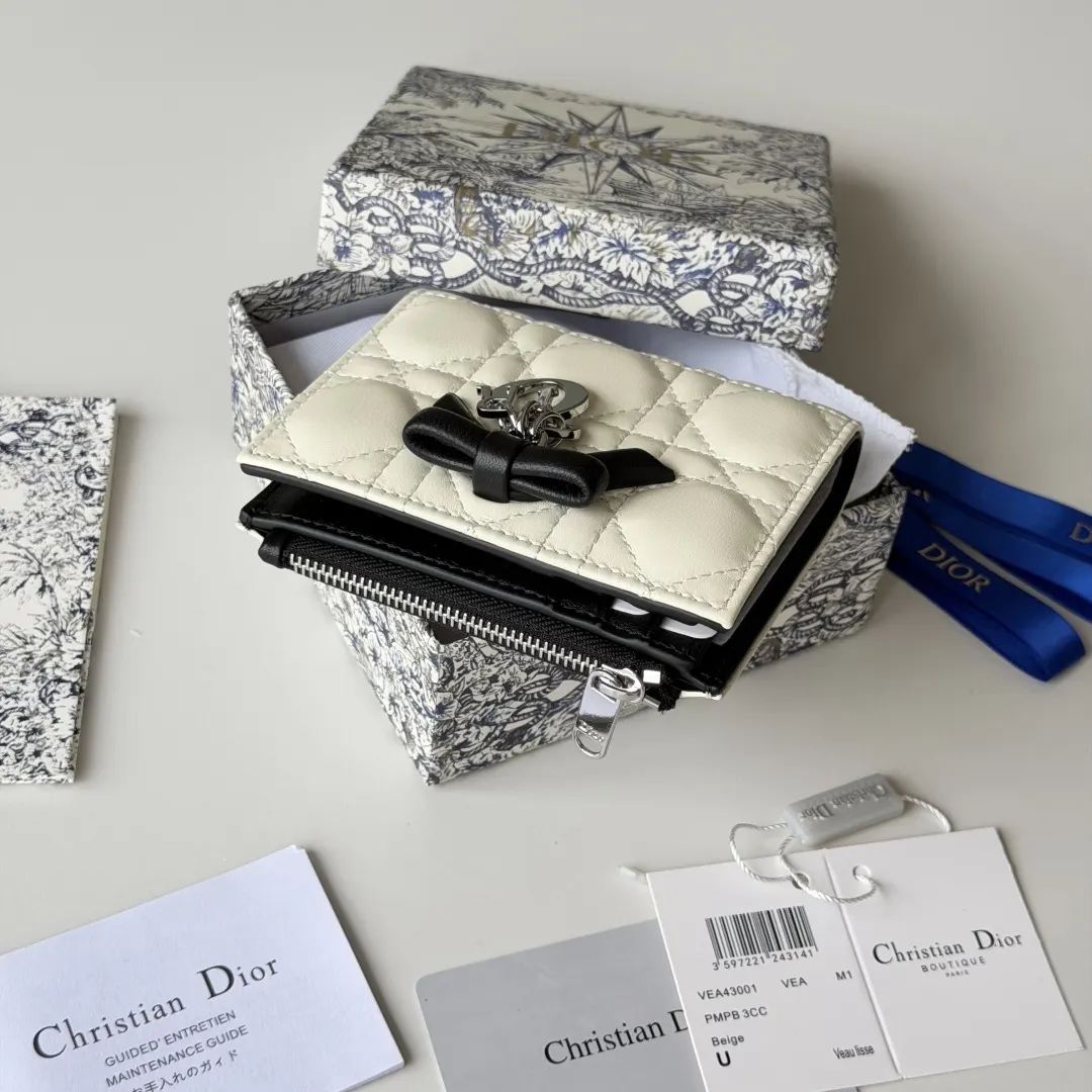 Dior 白色羊皮蝴蝶结化妆包 手拿